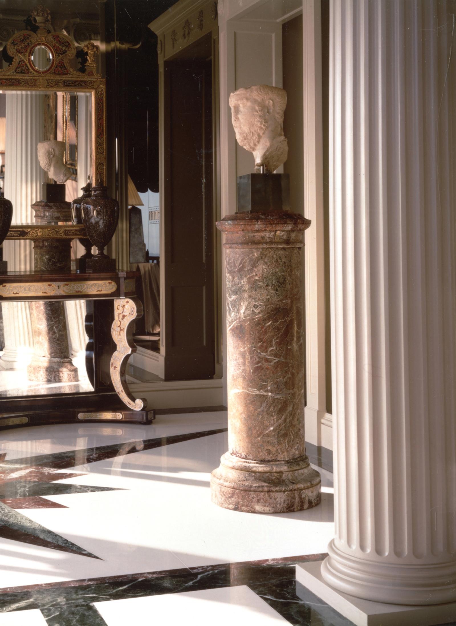 An antique-filled private foyer